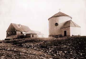 The summit of Sněžka with St Lawrence's Chapel and the mountain hut